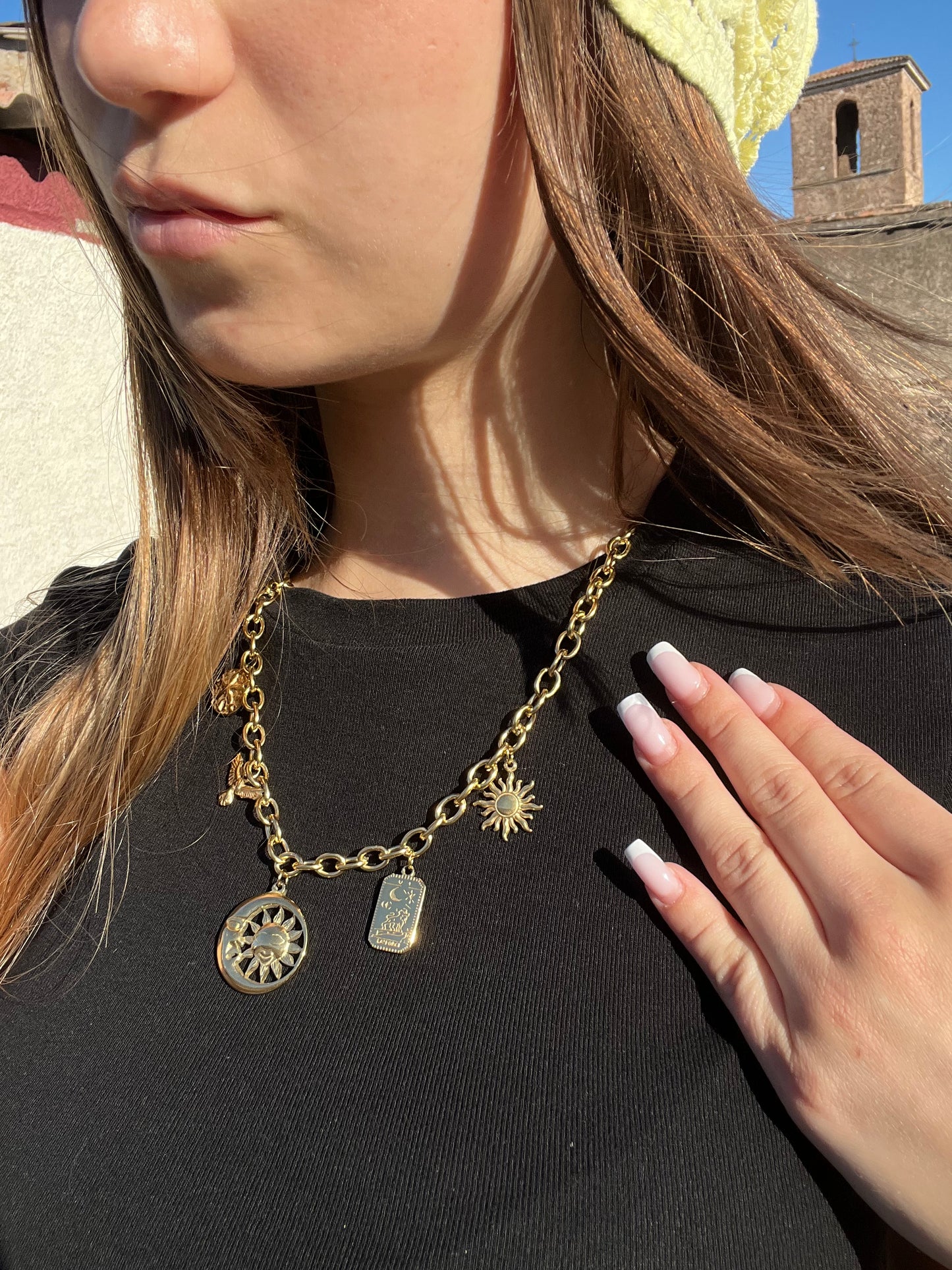 Collier soleil et carte